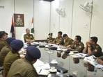 Police officials holding a meeting ahead of Holi in Lucknow. (SOURCED)