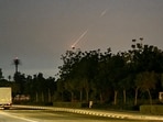A projectile falls over Dubai as Iran retaliates to US, Israel offensive.