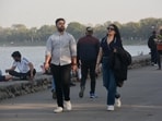 Visitors enjoying the weather at Sukhna Lake in Chandigarh on Saturday. (Sant Arora/HT)