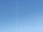 Rocket trails from Israel's Iron Dome missile defence system are seen over Tel Aviv on February 28