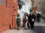 People run for cover following an explosion, after Israel said it launched a pre-emptive attack against Iran.