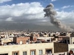 Smoke billows following the pre-emptive strike from Israel and the United States, in Tehran on Saturday.
