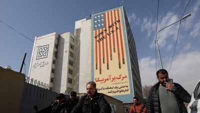 A graffiti on a wall reads" Down with the U.S.A", after Israel said it launched a pre-emptive attack against Iran, in Tehran, Iran, February 28. (Reuters)