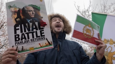Iranian people attend a demonstration in support of the U.S. and Israeli strikes on Iran in front of Iranian Embassy in Yerevan, Armenia, Saturday, Feb. 28, 2026. (AP Photo/Anthony Pizzoferrato) (AP) Iranian people attend a demonstration in support of the U.S. and Israeli strikes on Iran in front of Iranian Embassy in Yerevan, Armenia, Saturday, Feb. 28, 2026. (AP Photo/Anthony Pizzoferrato) (AP)