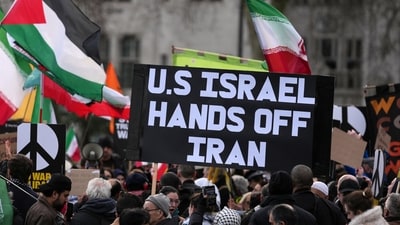 Protesters gather in London, Saturday, Feb. 28, 2026 after U.S. and Israeli forces carried out a series of strikes on Iran on Saturday morning. (AP Photo/Alastair Grant) (AP) Protesters gather in London, Saturday, Feb. 28, 2026 after U.S. and Israeli forces carried out a series of strikes on Iran on Saturday morning. (AP Photo/Alastair Grant) (AP)
