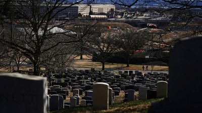 Visitors walk at Arlington National Cemetery, as the Pentagon stands in the background, on the day the United States and Israel launched strikes on Iran, in Arlington, Virginia, February 28, 2026. REUTERS/Nathan Howard (REUTERS)