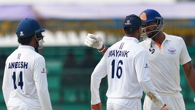 There was some needle involved in the match – a controversial moment as J&K captain Paras Dogra got into it with substitute fielder KV Aneesh, butting heads while he was at silly point. He had to be separated first by Mayank Agarwal, then by the umpires – and was subsequently fined 50% of his match fees. (PTI) There was some needle involved in the match – a controversial moment as J&K captain Paras Dogra got into it with substitute fielder KV Aneesh, butting heads while he was at silly point. He had to be separated first by Mayank Agarwal, then by the umpires – and was subsequently fined 50% of his match fees. (PTI)