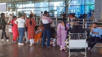 Chennai: Stranded passengers wait outside Terminal 2, amid cancellation of flights to the Middle East due to the US and Israel strikes on Iran, at the International Airport in Chennai, Tamil Nadu, Saturday, Feb. 28, 2026. (PTI Photo) (PTI02_28_2026_000615B) (PTI) Chennai: Stranded passengers wait outside Terminal 2, amid cancellation of flights to the Middle East due to the US and Israel strikes on Iran, at the International Airport in Chennai, Tamil Nadu, Saturday, Feb. 28, 2026. (PTI Photo) (PTI02_28_2026_000615B) (PTI)