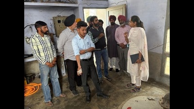 Senior administrative and health officials, led by additional deputy commissioner (development) Krishan Pal Rajput visited the village on Saturday. (HT) Senior administrative and health officials, led by additional deputy commissioner (development) Krishan Pal Rajput visited the village on Saturday. (HT)