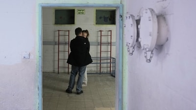 Civilians staying in a shelter after alarms announced that Israel had launched an attack on Iran, in Ramat Gan, Israel. (AP)