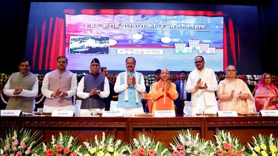 Chief minister Yogi Adityanath attends a programme under the Pradhan Mantri Ujjwala Yojana at Lok Bhavan. Deputy CMs Keshav Prasad Maurya and Brajesh Pathak, along with others, were also present. (HT PHOTO)