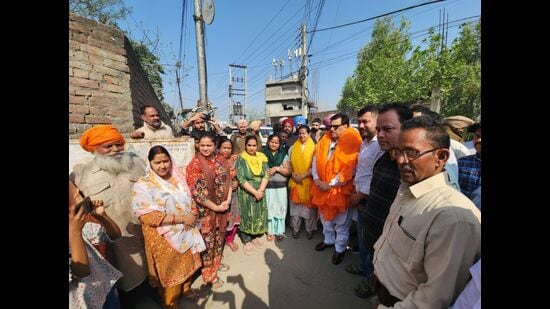Ludhiana North Aam Aadmi Party MLA Madan Lal Bagga after inaugurating the water project in Ward 93 on Saturday. (HT Photo)