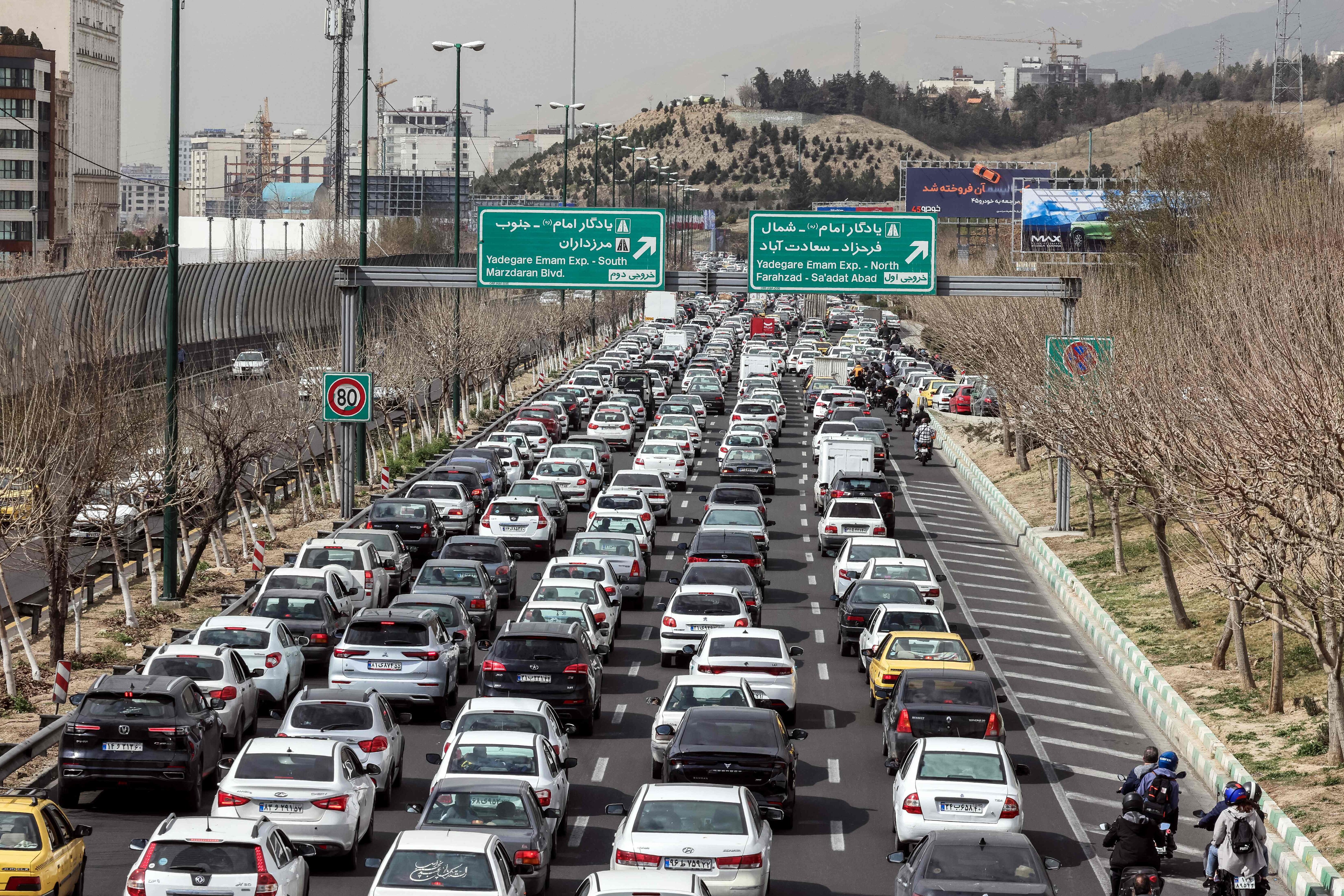 Motorists make their way along a street in Tehran on February 28. The United States and Israel launched strikes against Iran, with Israel's public broadcaster reporting that supreme leader Ayatollah Ali Khamenei had been targeted (AFP) Motorists make their way along a street in Tehran on February 28. The United States and Israel launched strikes against Iran, with Israel's public broadcaster reporting that supreme leader Ayatollah Ali Khamenei had been targeted (AFP)