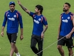 India's Axar Patel, Ishan Kishan and Varun Chakravarthy during a practice session at Eden Gardens on Saturday