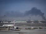 Emirates airplanes are parked at the Dubai International Airport after its closure in Dubai, United Arab Emirates, Emirates airplanes are parked at the Dubai International Airport after its closure in Dubai, United Arab Emirates,
