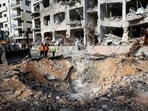 US-Israel-Iran conflict: Emergency personnel stand at the site of an Iranian missile strike on a residential building, after Iran launched missile barrages following attacks by the U.S. and Israel on Saturday, in Tel Aviv, Israel March 1, 2026.
