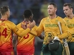 New Delhi: South African players shake hands with Zimbabwe players after winning in the ICC Men's T20 World Cup 2026 cricket match between Zimbabwe and South Africa, at Arun Jaitley Stadium in New Delhi, Sunday, Mar. 1, 2026. (PTI Photo/Karma Bhutia)(PTI03_01_2026_000612A) (PTI)