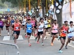 Runners participating in the first Chandigarh International Marathon. (Sanjeev Sharma/HT)