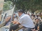 Security forces, along with Manipur Police, blocked the protesters at the main gate of Congress Bhavan, preventing them from marching ahead (Sourced)