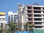 iMumbai, India - March 01, 2026: Demolition of Ratan Kunj Building dangerous manner at Four Bunglow in Mumbai, India, on Sunday, March 01, 2025. (Photo by Satish Bate/ Hindustan Times) (Hindustan Times)