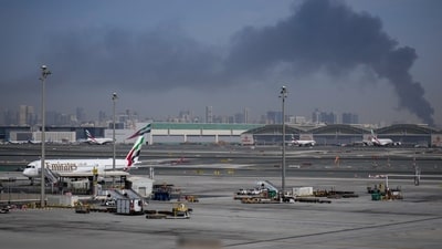 Emirates airplanes are parked at the Dubai International Airport after its closure in Dubai, United Arab Emirates, (AP) Emirates airplanes are parked at the Dubai International Airport after its closure in Dubai, United Arab Emirates, (AP)