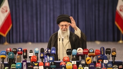 Ayatollah Ali Khamenei gestures as he addresses the press after casting his ballot in the presidential runoff elections in Tehran on June 28, 2024. ((Photo by ATTA KENARE / AFP)) Ayatollah Ali Khamenei gestures as he addresses the press after casting his ballot in the presidential runoff elections in Tehran on June 28, 2024. ((Photo by ATTA KENARE / AFP))