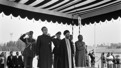 Ayatollah Ali Khamenei (C), Pakistani President General Muhammad Zia-ul-Haq (R) and Prime Minister Mohammad Khan Junejo (2nd L) listen to the national anthems on January 13, 1986, upon Khamenei's arrival in Islamabad, Pakistan ((Photo by Ahmed ASHFAQ / AFP)) Ayatollah Ali Khamenei (C), Pakistani President General Muhammad Zia-ul-Haq (R) and Prime Minister Mohammad Khan Junejo (2nd L) listen to the national anthems on January 13, 1986, upon Khamenei's arrival in Islamabad, Pakistan ((Photo by Ahmed ASHFAQ / AFP))