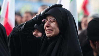 A woman mourns the death of Iran's supreme leader Ayatollah Ali Khamenei, who was killed in joint US and Israeli strikes, at a square in Tehran on March 1, 2026. Photo by ATTA KENARE / AFP) (AFP) A woman mourns the death of Iran's supreme leader Ayatollah Ali Khamenei, who was killed in joint US and Israeli strikes, at a square in Tehran on March 1, 2026. Photo by ATTA KENARE / AFP) (AFP)