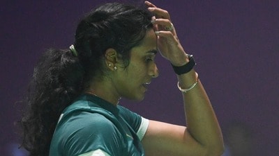 New Delhi, India - Jan. 14, 2026: PV Sindhu from India seen along with her coach Irwansyah Adi Pratama as she competes during the Womens Single match against Nguyen Thùy Linh from Vietnam during the second day of YONEX-SUNRISE India Open 2026 at Indira Gandhi Sports Complex in New Delhi, India, on Wednesday, January 14, 2026.  (Photo by Sanchit Khanna/ Hindustan Times) (Hindustan Times)