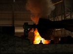 A worker stands in front of a furnace at a steel processing production line of a factory in Mandi Gobindgarh in Punjab. (Reuters file)