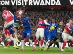 Arsenal's Jurrien Timber, third left, scores against Chelsea.