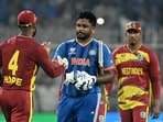 India's Sanju Samson (C) is congratulated by West Indies' captain Shai Hope (L) for his team's win at the end of their T20 World Cup Super Eights match India's Sanju Samson (C) is congratulated by West Indies' captain Shai Hope (L) for his team's win at the end of their T20 World Cup Super Eights match