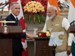 Canadian Prime Minister Mark Carney and Prime Minister Narendra Modi shake hands following the presentation of agreements and joint statements in New Delhi on March 2 (AP)