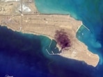 Handout satellite image taken by 2026 Planet Labs PBC on March 1 shows a smoke plume billowing from Konarak Naval Base in southern Iran along the Gulf of Oman.