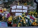 A memorial is seen in front of Nancy Guthrie's residence after a no-parking policy was implemented for the area around the home.