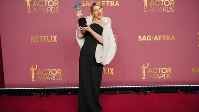 Jessie Buckley, who took home the award for outstanding performance by a female actor in a leading role for Hamnet, fired up the drama in a custom Balenciaga black silk wool crepe bustier dress. The look was accented with a dramatic white silk faille veil. (Jordan Strauss/Invision/AP) Jessie Buckley, who took home the award for outstanding performance by a female actor in a leading role for Hamnet, fired up the drama in a custom Balenciaga black silk wool crepe bustier dress. The look was accented with a dramatic white silk faille veil. (Jordan Strauss/Invision/AP)