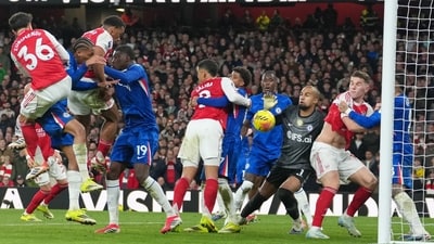 Arsenal's Jurrien Timber, third left, scores against Chelsea. (AP) Arsenal's Jurrien Timber, third left, scores against Chelsea. (AP)