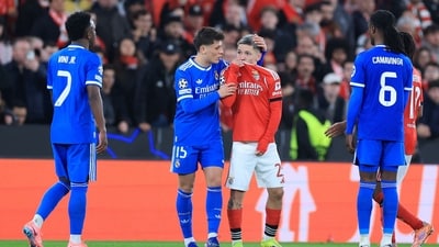 Gianluca Prestianni hides his mouth while arguing with Vinicius Junior. (AFP) Gianluca Prestianni hides his mouth while arguing with Vinicius Junior. (AFP)