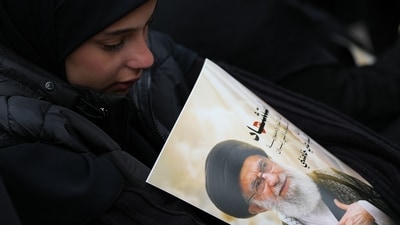 A young woman cries as she mourns the death of Iranian Supreme Leader Ayatollah Ali Khamenei, during a gathering in the southern Suburb of Beirut, Lebanon, Sunday, March 1, 2026. (AP Photo/Hassan Ammar) (AP)