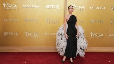 The Substance fame Demi Moore looked gorgeous in a voluminous tulle ensemble from Schiaparelli's 2026 couture collection. Her dramatic look featured a sculptural strapless neckline, with a textured pattern down the front. The most breathtaking detail was a massive white tulle piece, speckled with black polka dots, attached to the back of the dress. (Getty Images via AFP) The Substance fame Demi Moore looked gorgeous in a voluminous tulle ensemble from Schiaparelli's 2026 couture collection. Her dramatic look featured a sculptural strapless neckline, with a textured pattern down the front. The most breathtaking detail was a massive white tulle piece, speckled with black polka dots, attached to the back of the dress. (Getty Images via AFP)