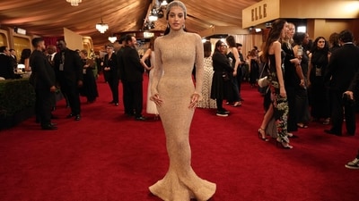 One Battle After Another star Chase Infiniti channeled Old Hollywood glamour in a skin-tight floor-length embellished mermaid gown from Louis Vuitton. Her all-nude look was paired with a shimmering headpiece reminiscent of ‘20s and ’30s Hollywood style. (AFP) One Battle After Another star Chase Infiniti channeled Old Hollywood glamour in a skin-tight floor-length embellished mermaid gown from Louis Vuitton. Her all-nude look was paired with a shimmering headpiece reminiscent of ‘20s and ’30s Hollywood style. (AFP)
