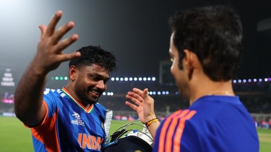 Sanju Samson and Gautam Gambhir embrace after India beat West Indies (AFP)