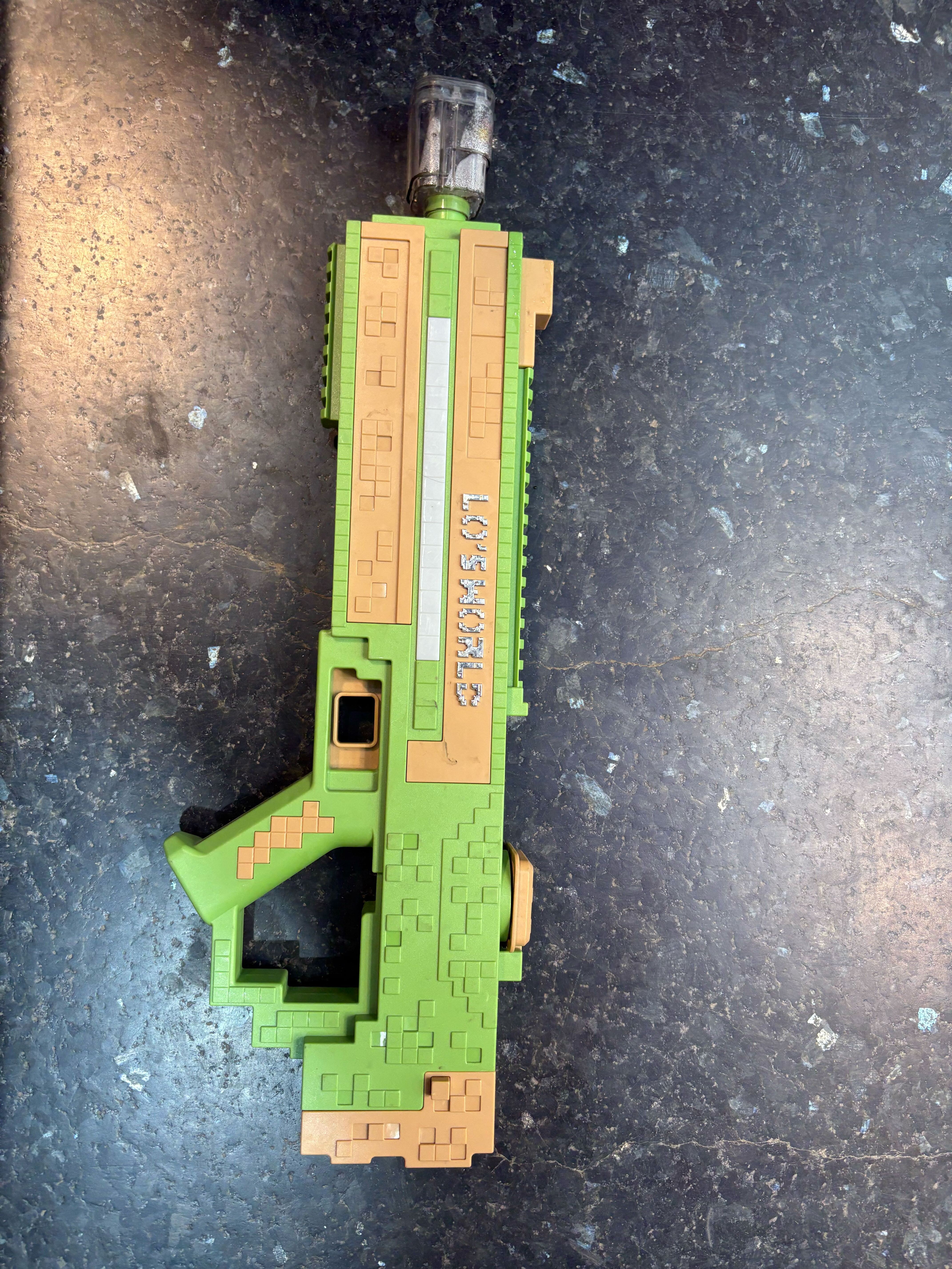 Game on, gulal on: Battery-operated water guns are a hot pick among young gaming enthusiasts, especially Minecraft fans. Price: ₹1,600 Game on, gulal on: Battery-operated water guns are a hot pick among young gaming enthusiasts, especially Minecraft fans. Price: ₹1,600