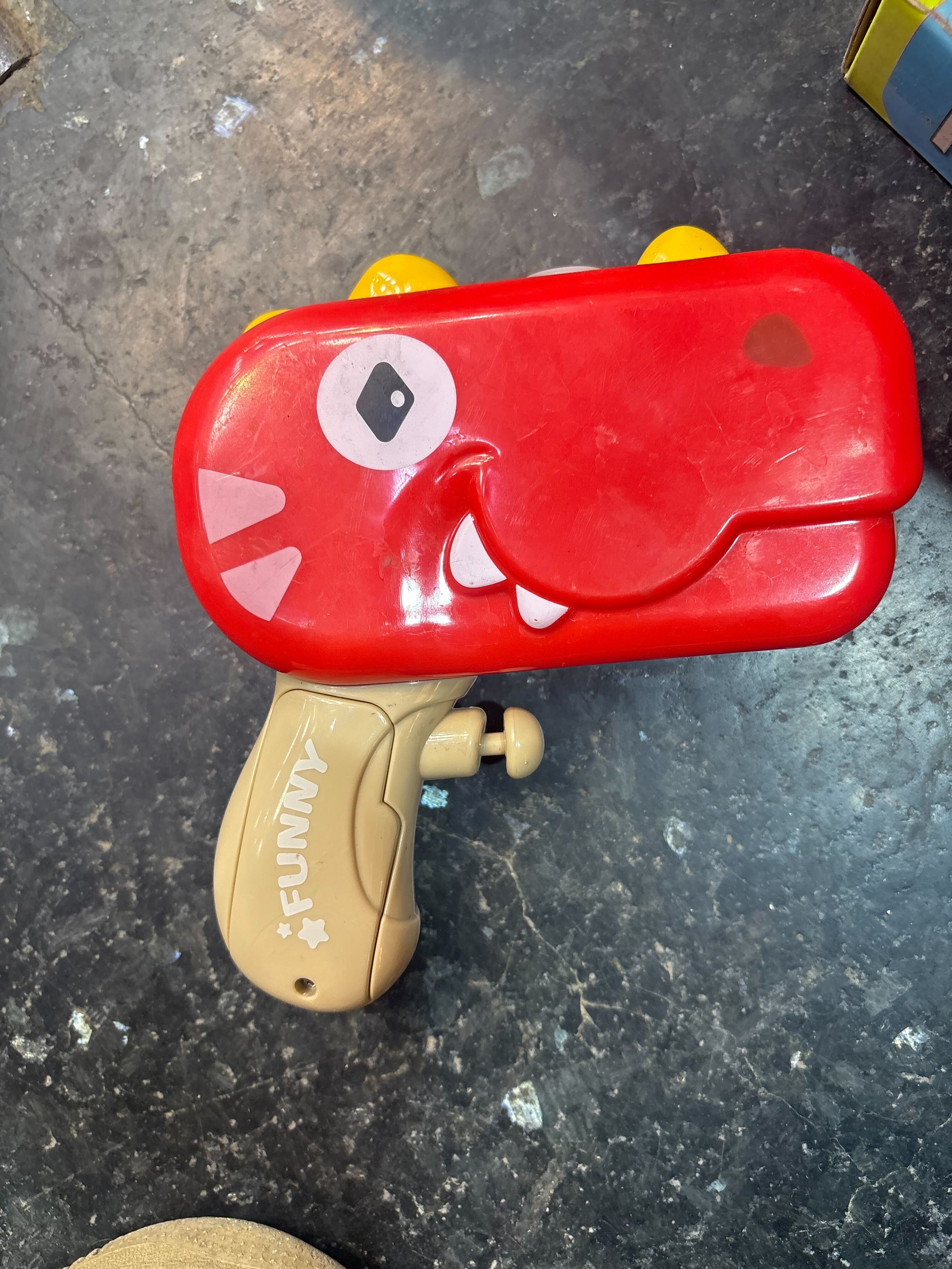 Young ones are loving the dinosaur-shaped water gun with in-built music that plays when it sprays! Price: ₹450 Young ones are loving the dinosaur-shaped water gun with in-built music that plays when it sprays! Price: ₹450