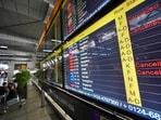 Passengers wait as airspace closures over parts of West Asia continue to disrupt flight operations, leading to the cancellation of flights at Terminal 3, Indira Gandhi International Airport, in New Delhi, India, on Tuesday, March 3, 2026
