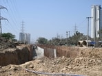 CAQM notices, Grap fines and survey findings underline gaps in mitigation even as GMDA says 75% of drain work is complete. (Parveen Kumar/HT)