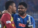 Shimron Hetmyer hugs Sanju Samson.