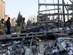 Firefighters work following an Israeli and US strike on a police station, amid the US-Israel conflict with Iran. 