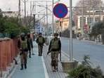 Security personnel patrolling a street in Srinagar on Tuesday as the authorities imposed restrictions across the Kashmir Valley. (AFP Photo) Security personnel patrolling a street in Srinagar on Tuesday as the authorities imposed restrictions across the Kashmir Valley. (AFP Photo)