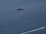 Boats in the Strait of Hormuz amid the US-Israeli conflict with Iran, as seen from Musandam, Oman.